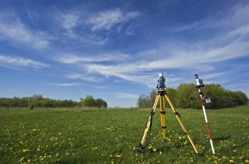 homeguide-land-survey-instrument-in-field